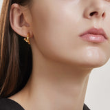 Sélection. D Brass Earring