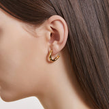 Sélection. D Brass Earring