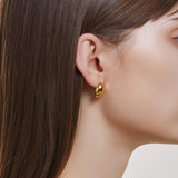 Sélection. D Brass Earring