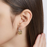 Selection. D Brass Earring