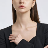 Selection. D Brass Earring