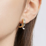 Selection. D Brass Earring