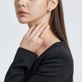 Selection. D Brass Earring
